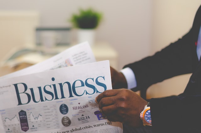 person holding business paper