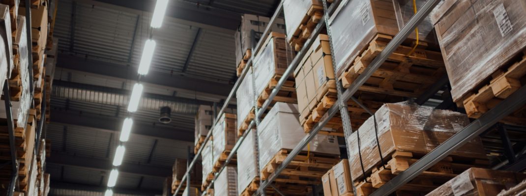 brown-cardboard-boxes-on-white-metal-rack