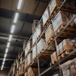 brown-cardboard-boxes-on-white-metal-rack