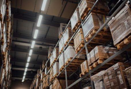 brown-cardboard-boxes-on-white-metal-rack