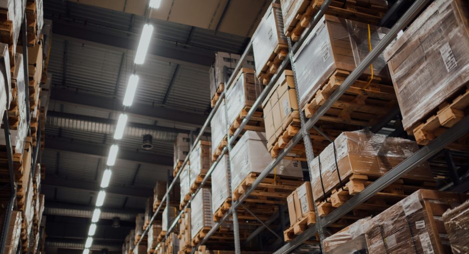 brown-cardboard-boxes-on-white-metal-rack